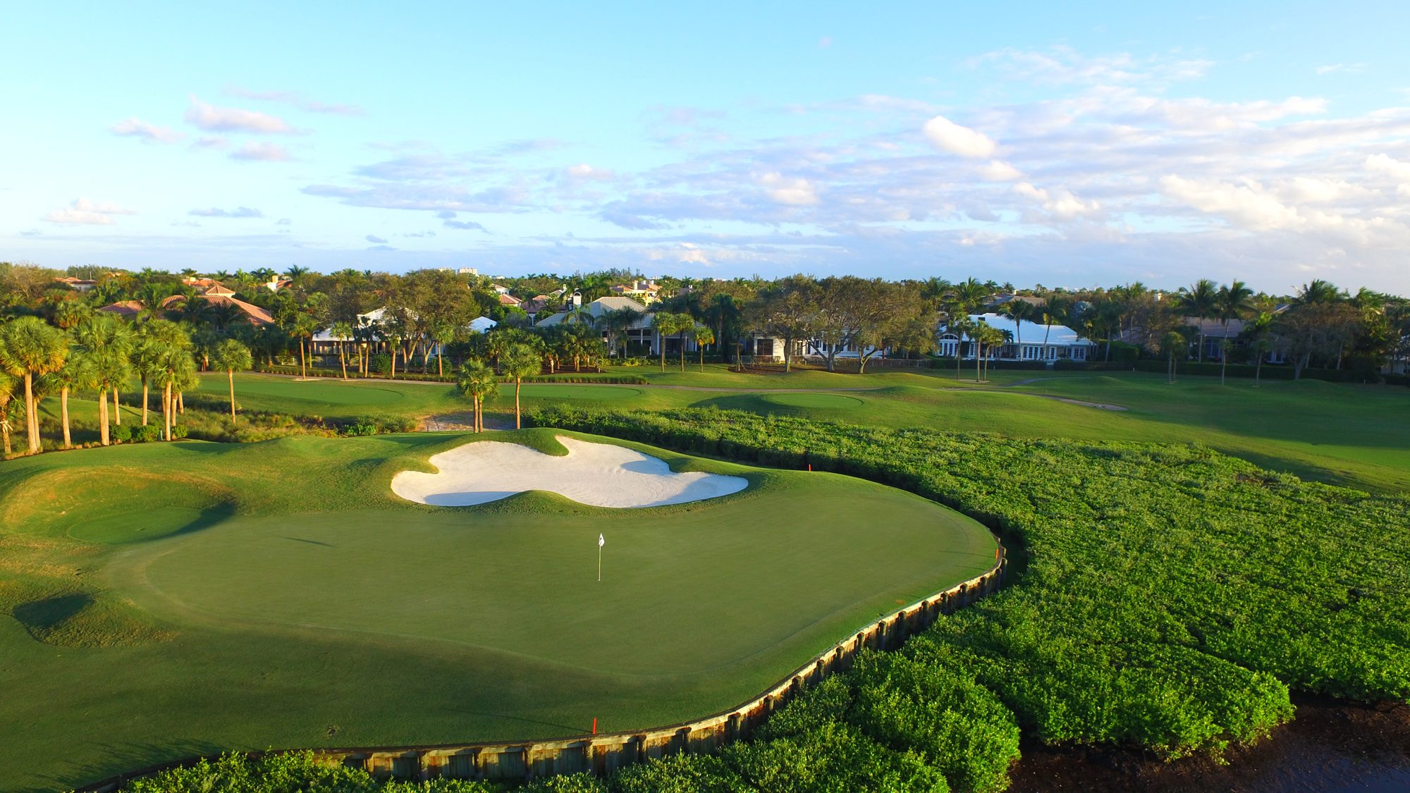 The Admirals Cove Golf Village clubhouse and practice greens