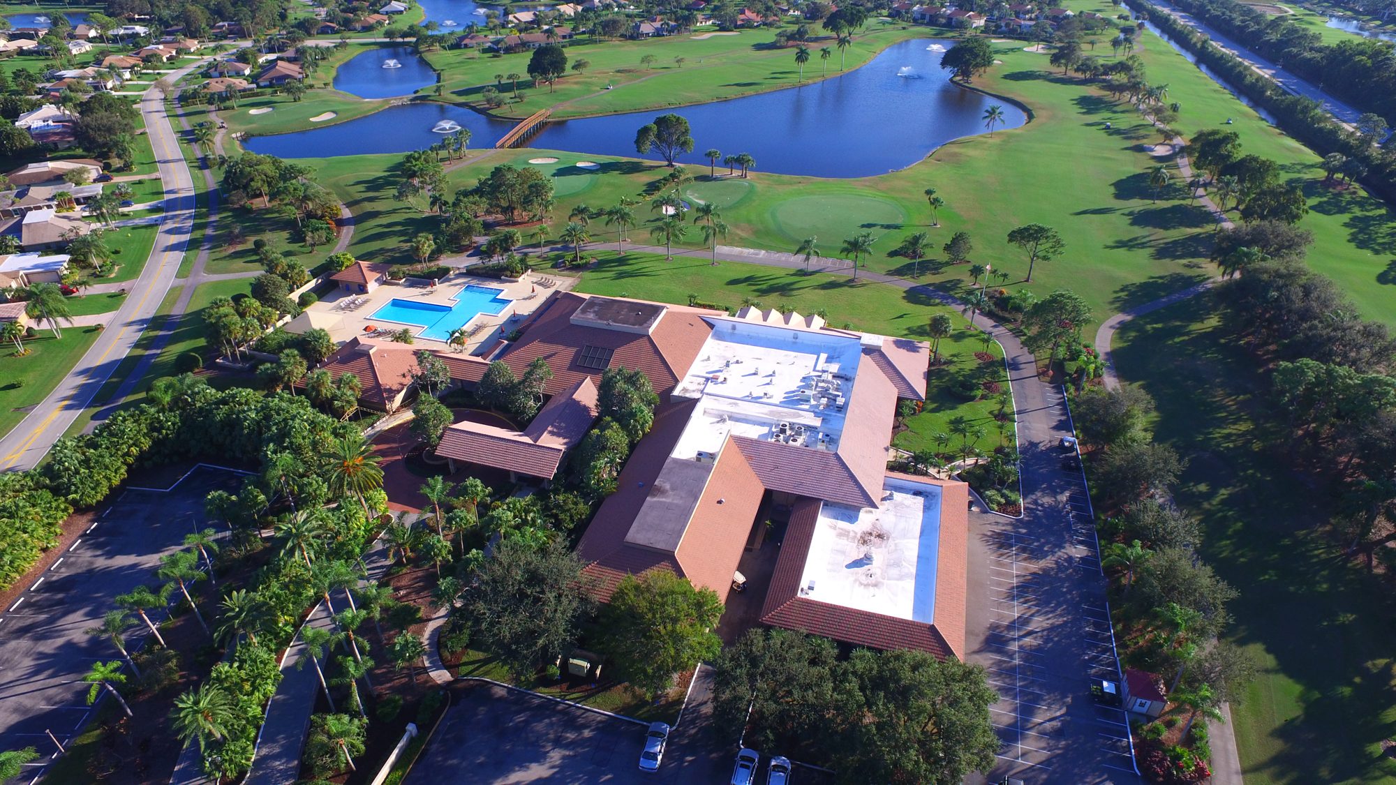 The East Point clubhouse beside its island green and fountain