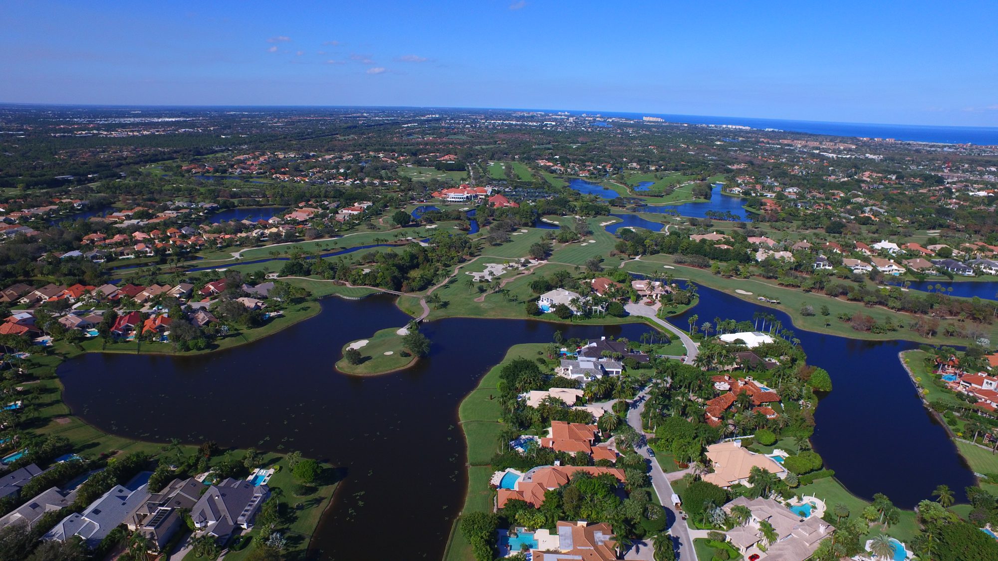 The Frenchman's Creek Beach Club pool, cabanas and boardwalk to the ocean