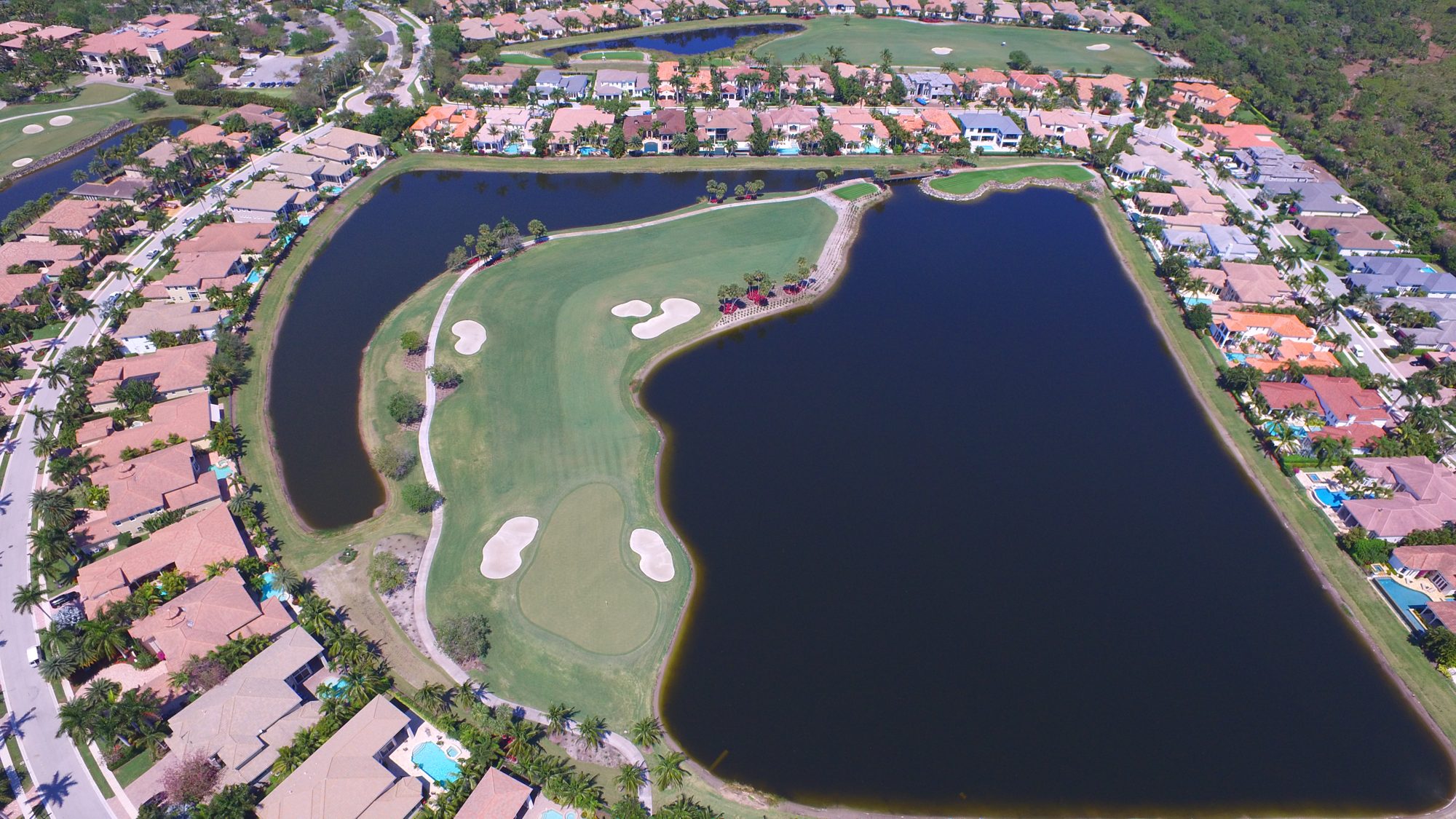 Mediterranean Revival homes along the lakes at Frenchman\