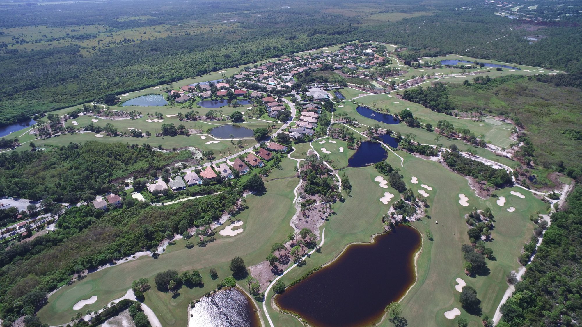 Hobe Sound Golf Club and its homes surrounded by open preserve