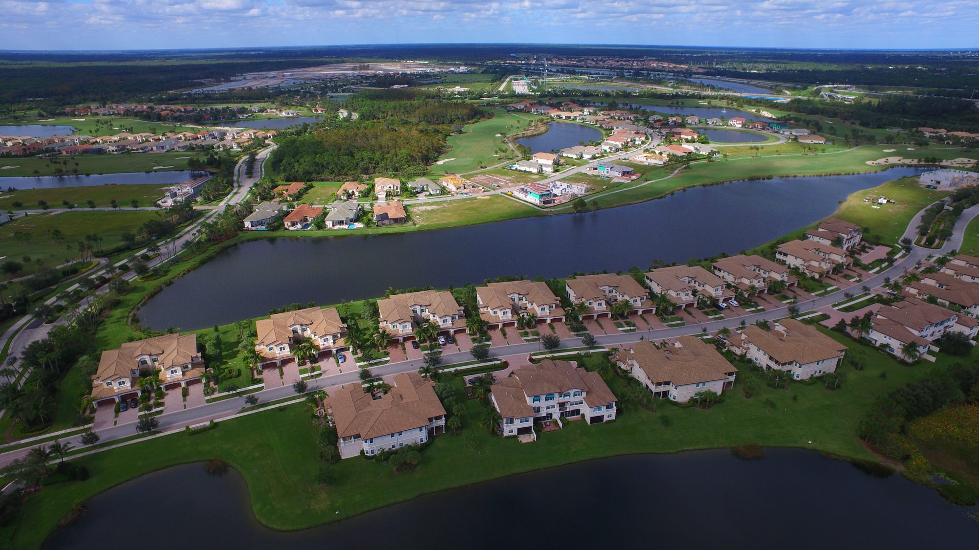 Jupiter Country Club residences along a lake