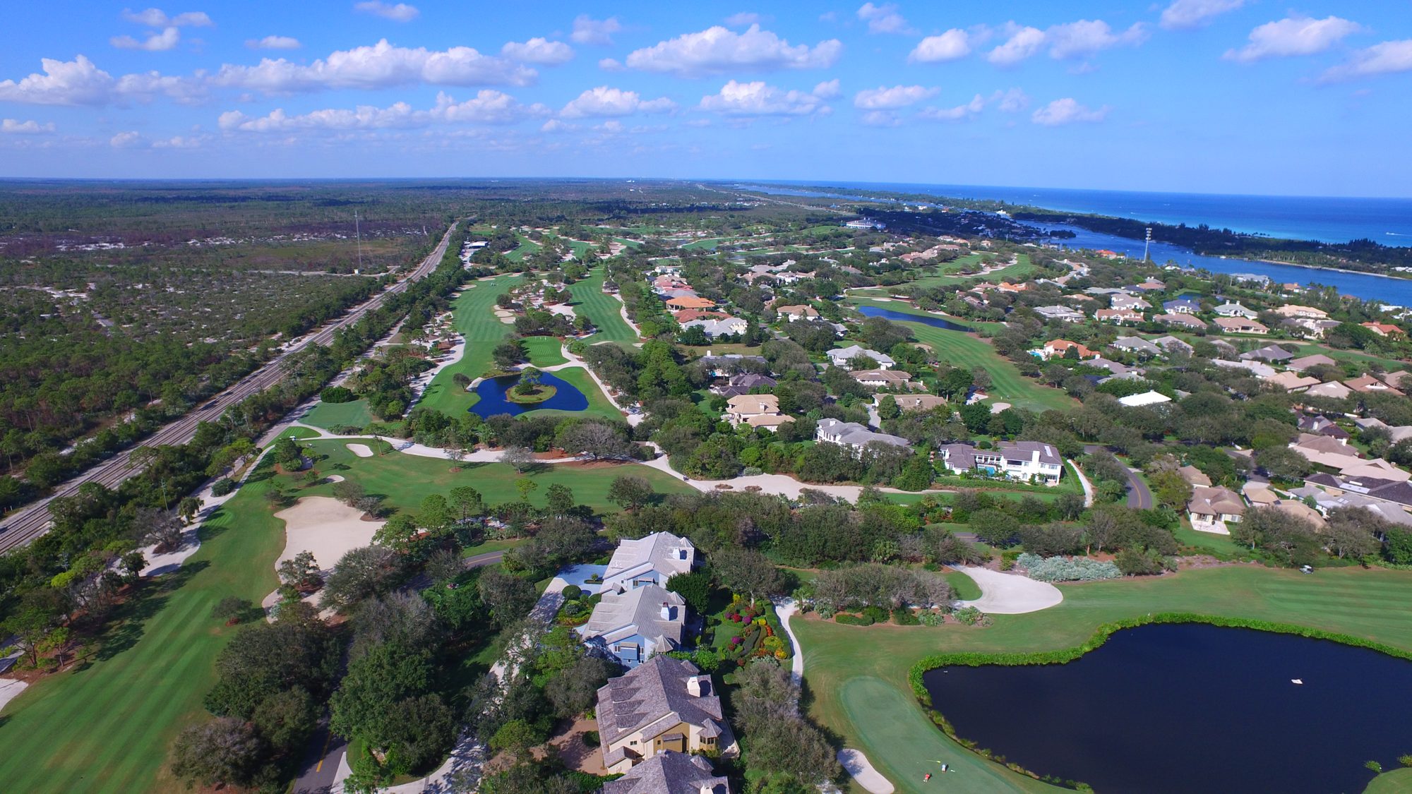 Jupiter Hills homes among the fairways beside the Intracoastal