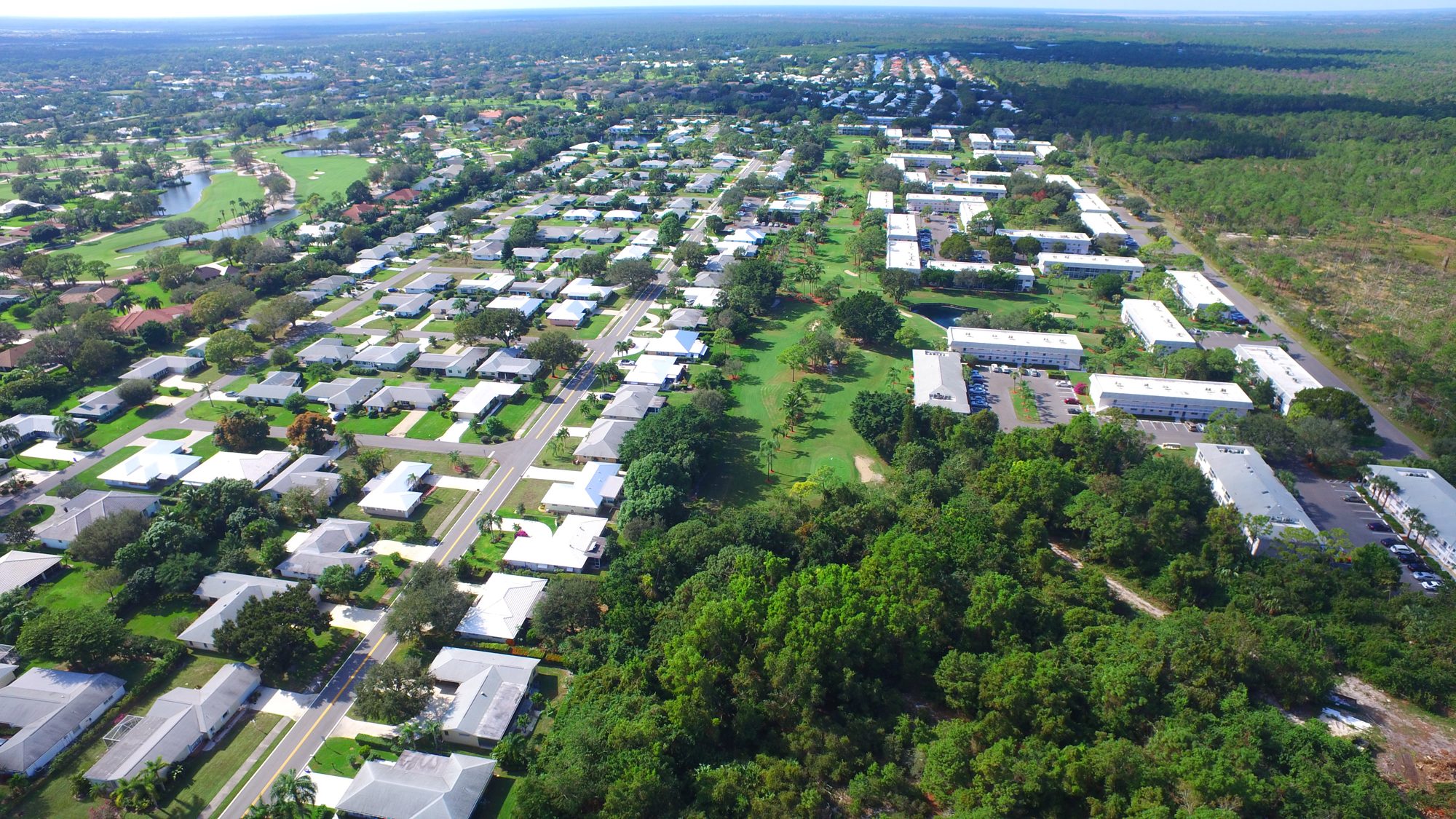 Little Club homes and condominiums along the course, bordered by preserve