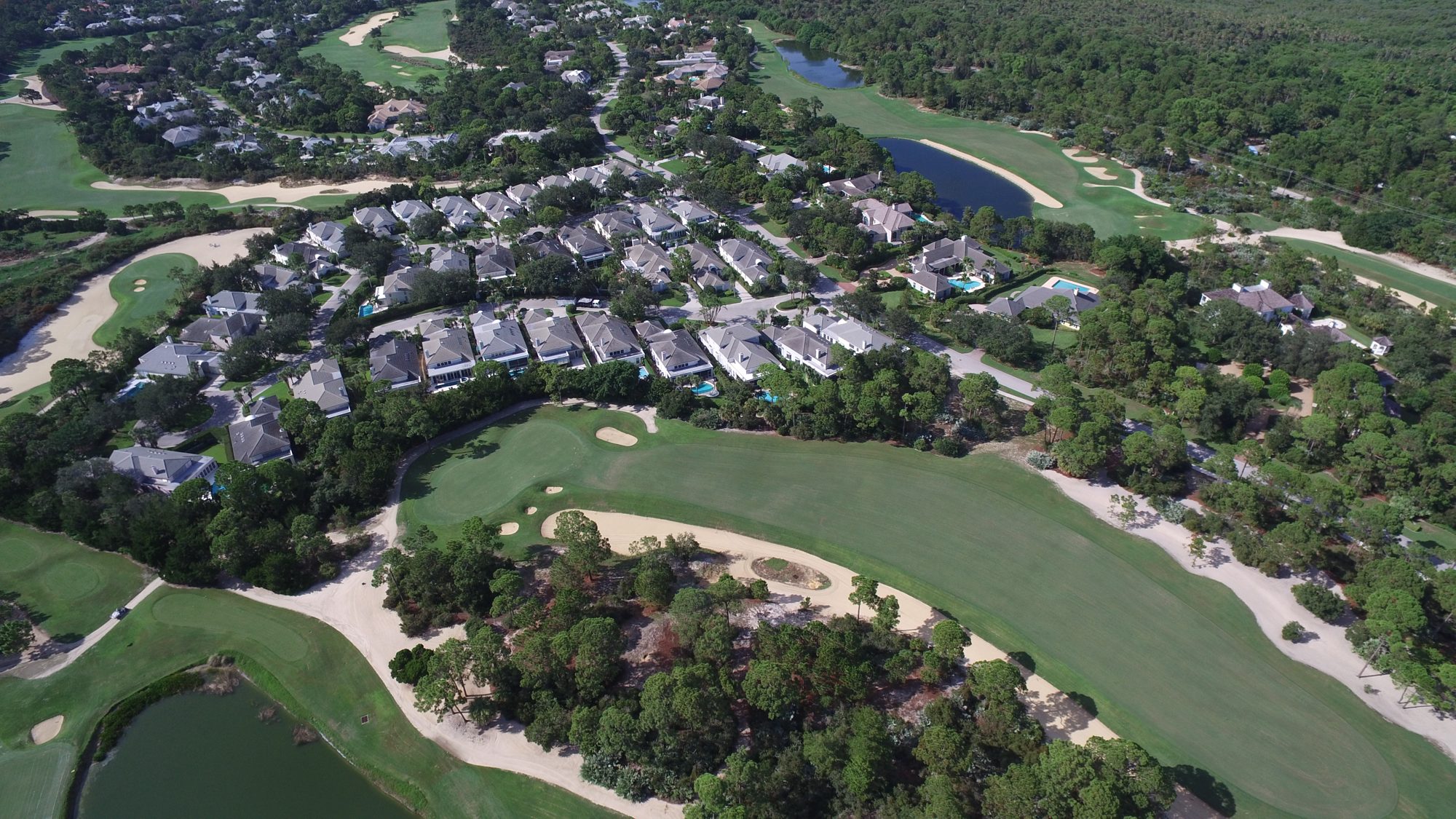The Loblolly clubhouse, pool, tennis courts and practice range