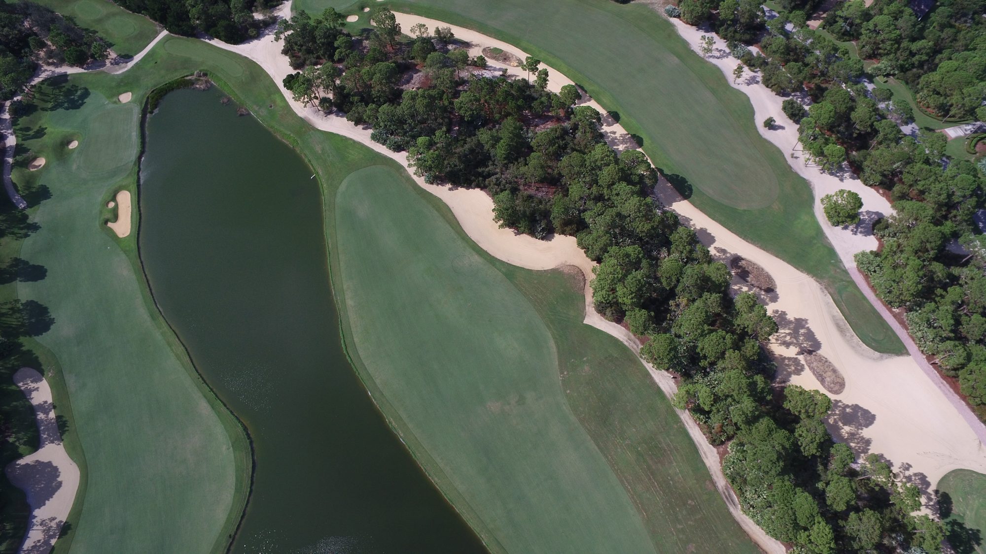Overhead view of Loblolly fairways, a lake and sandy waste areas