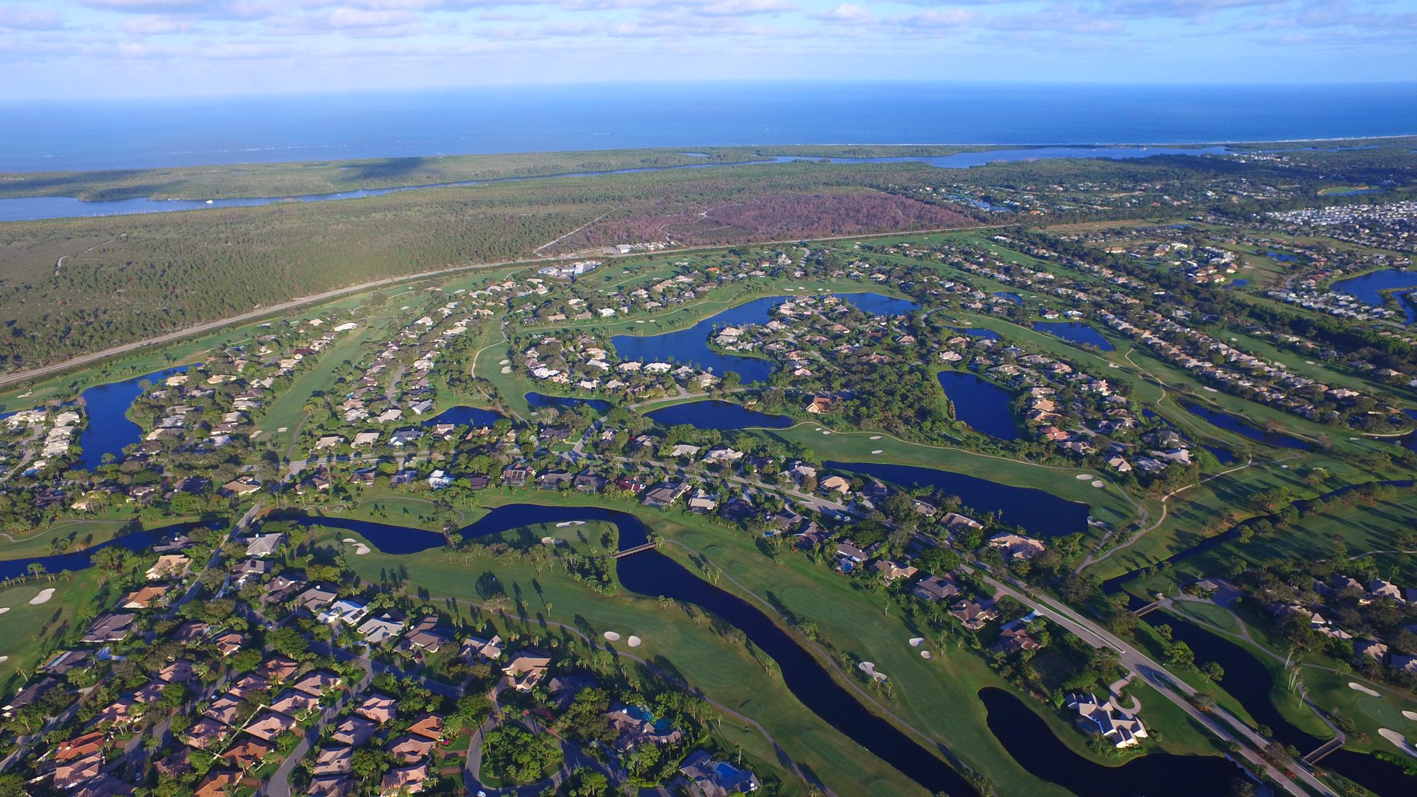 Mariner Sands courses and lakes with the Intracoastal and ocean beyond
