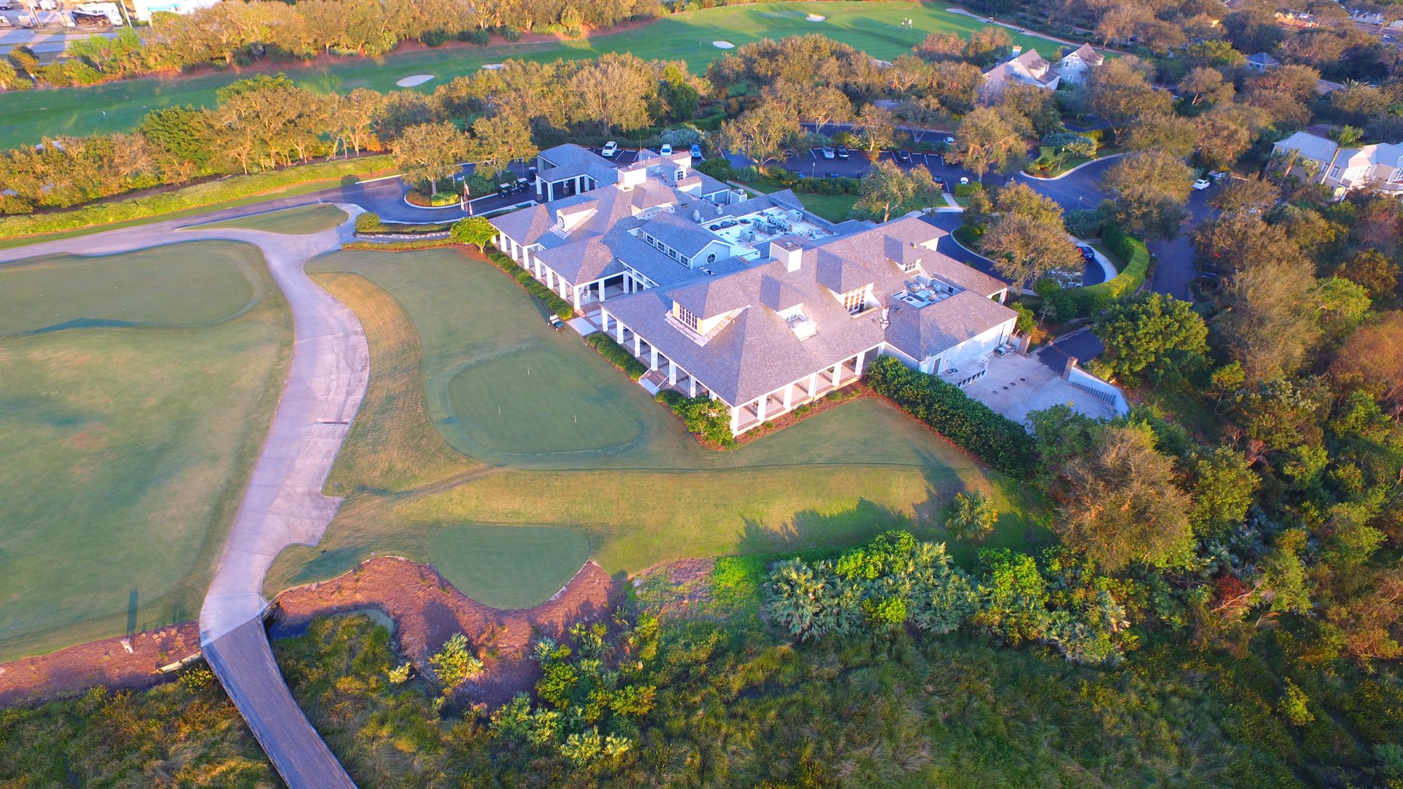 The Medalist entry, clubhouse and practice range at sunrise