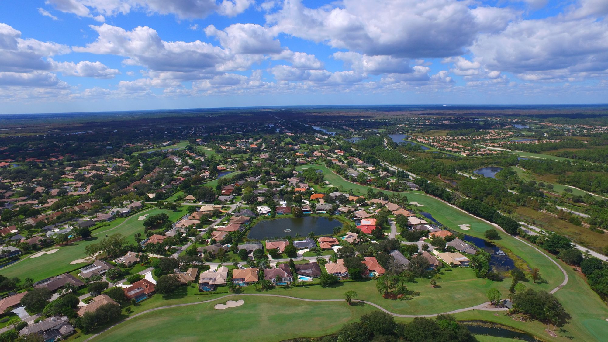 The PGA National croquet lawns beside a canal
