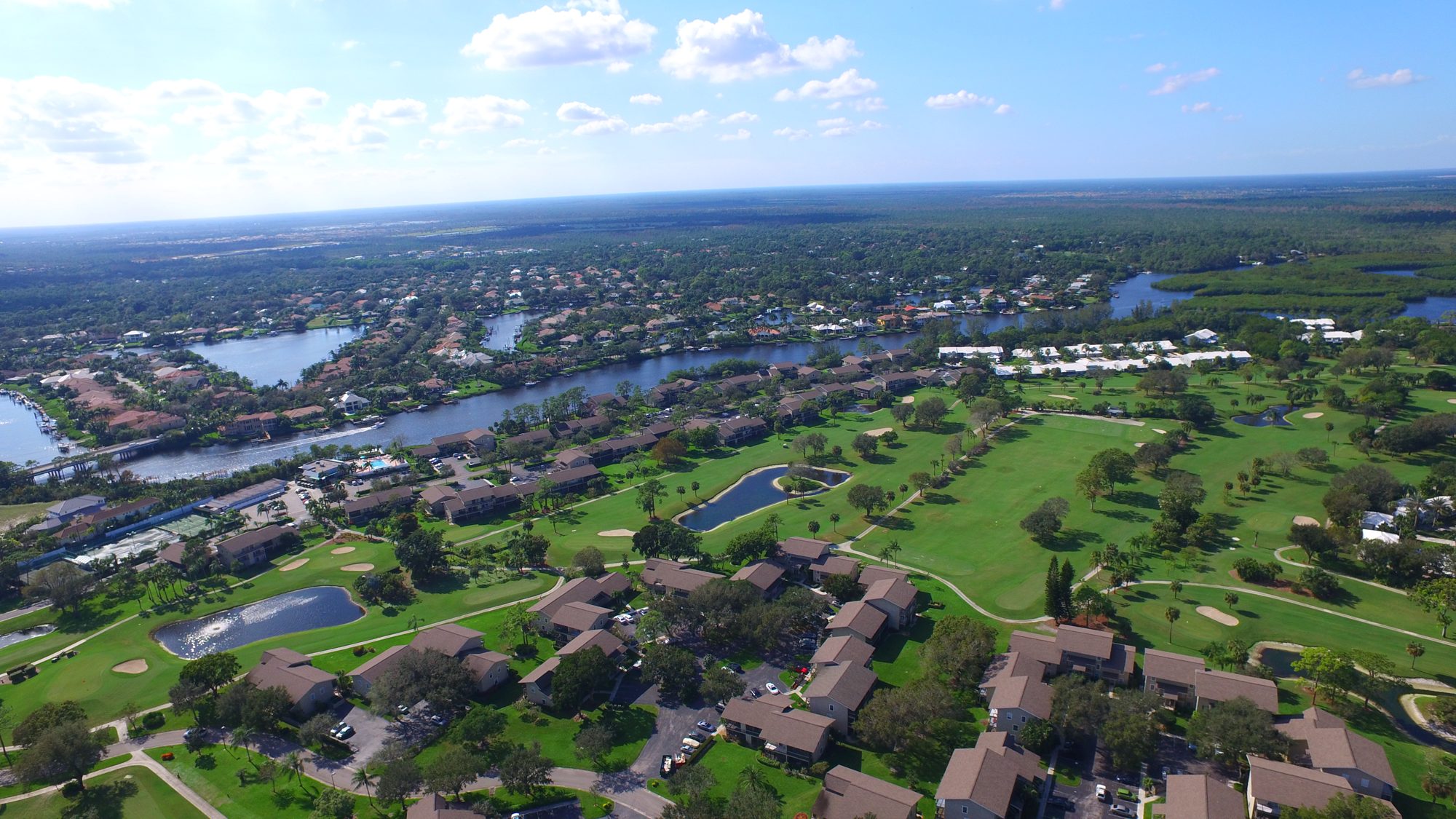 The Riverbend pool and courts on the river
