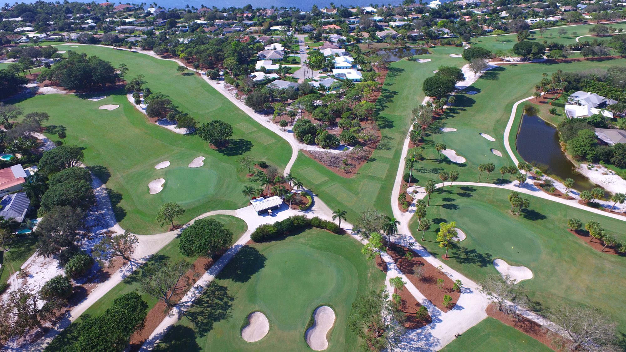 Homes along a Tequesta Country Club fairway with the river behind