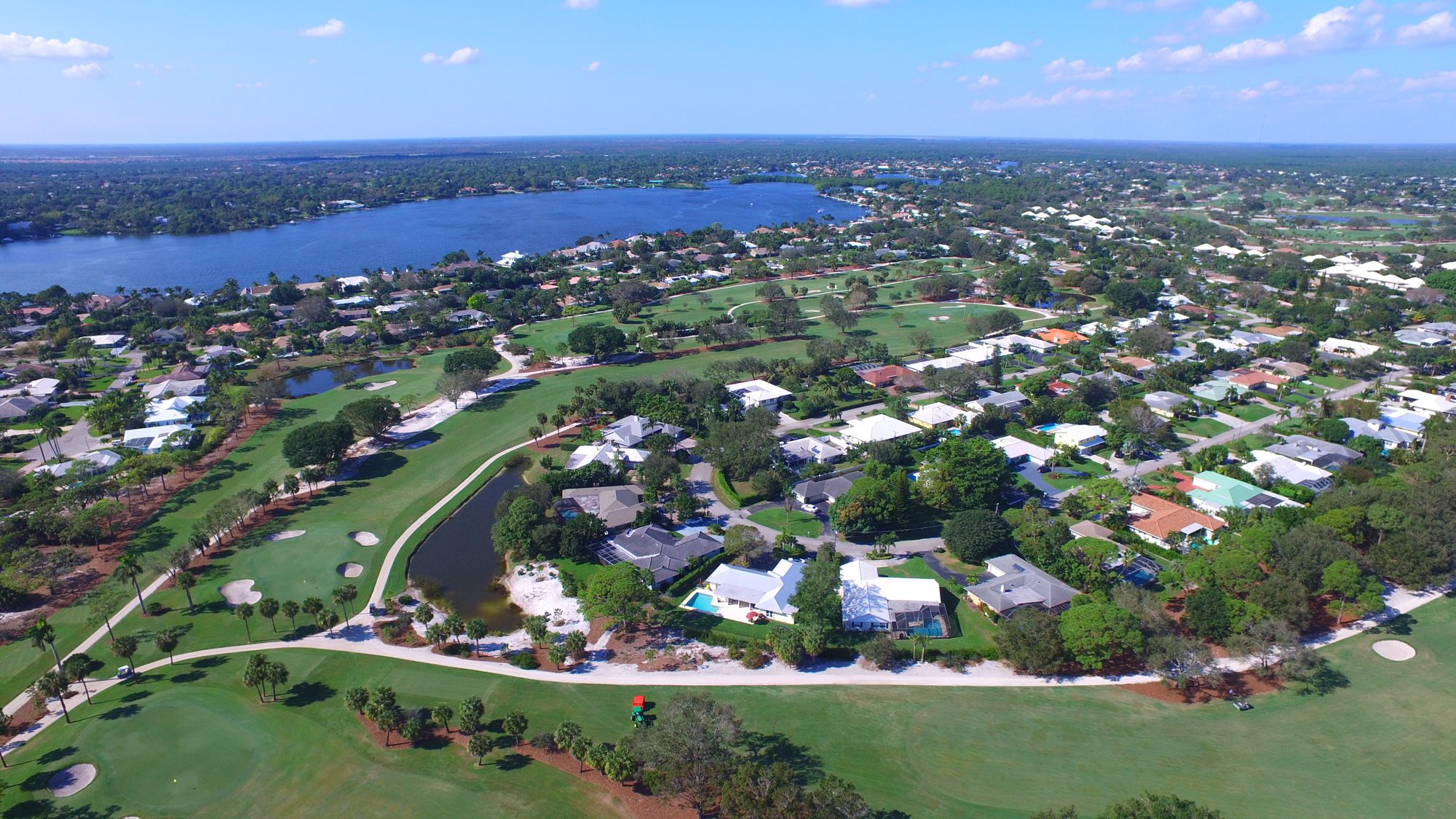 Deepwater canal homes beside the course and the Loxahatchee River