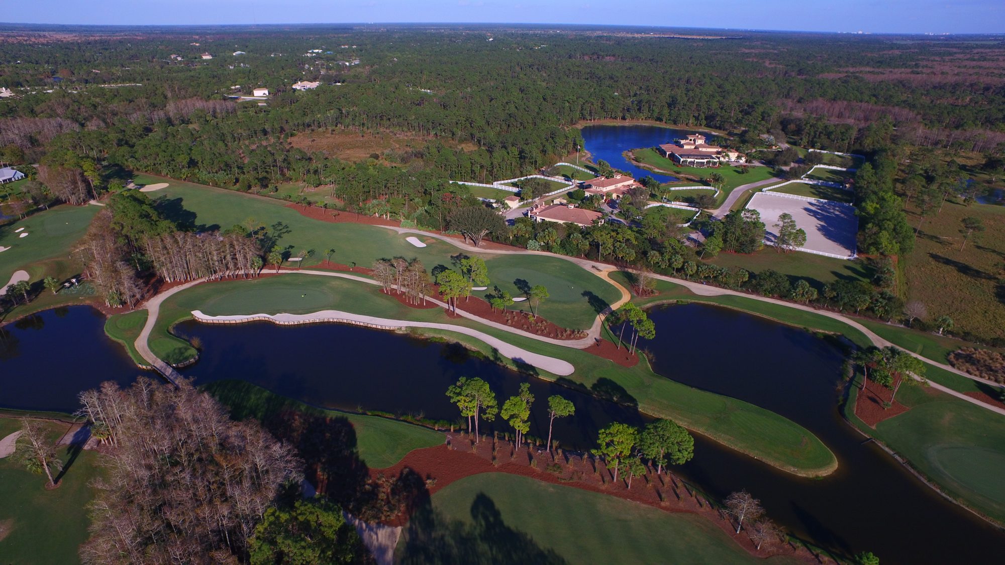 A bridge across the lake between Dye Preserve holes