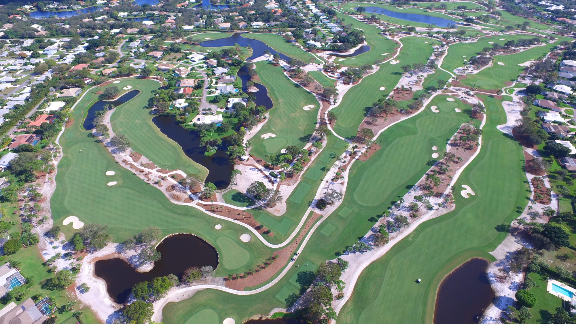 The Turtle Creek lake hole at sunset from behind the clubhouse